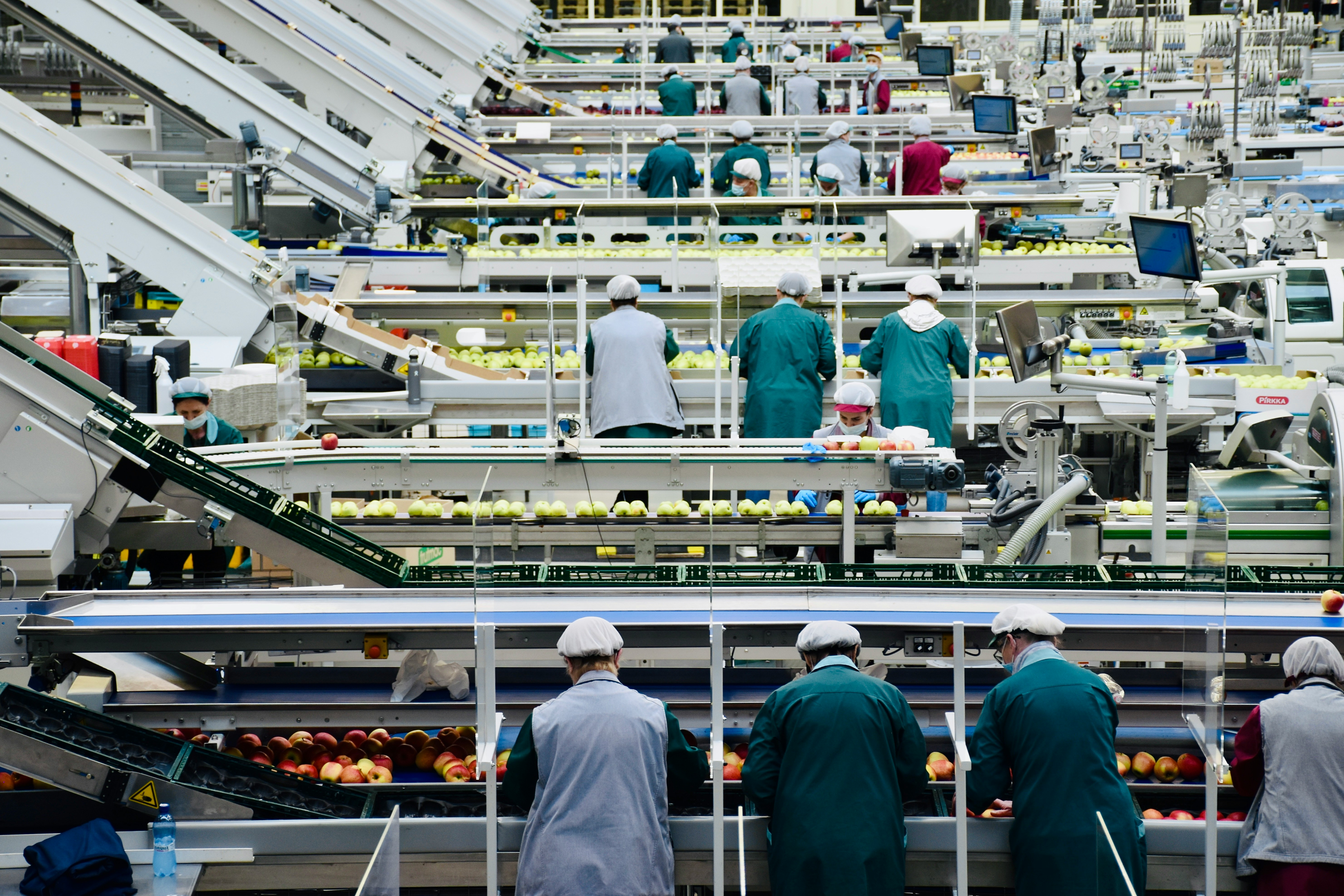 Group of men working in factory