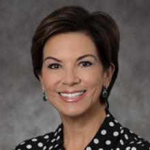 Headshot of Vicky Rey
